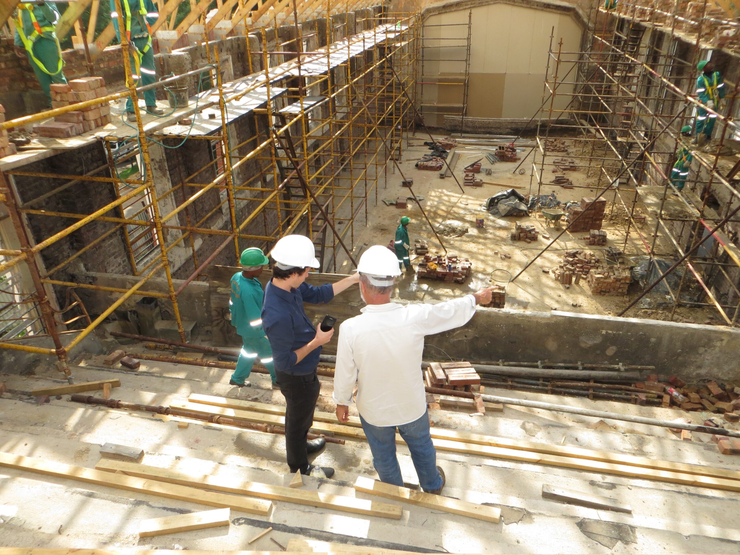 Men looking over construction site