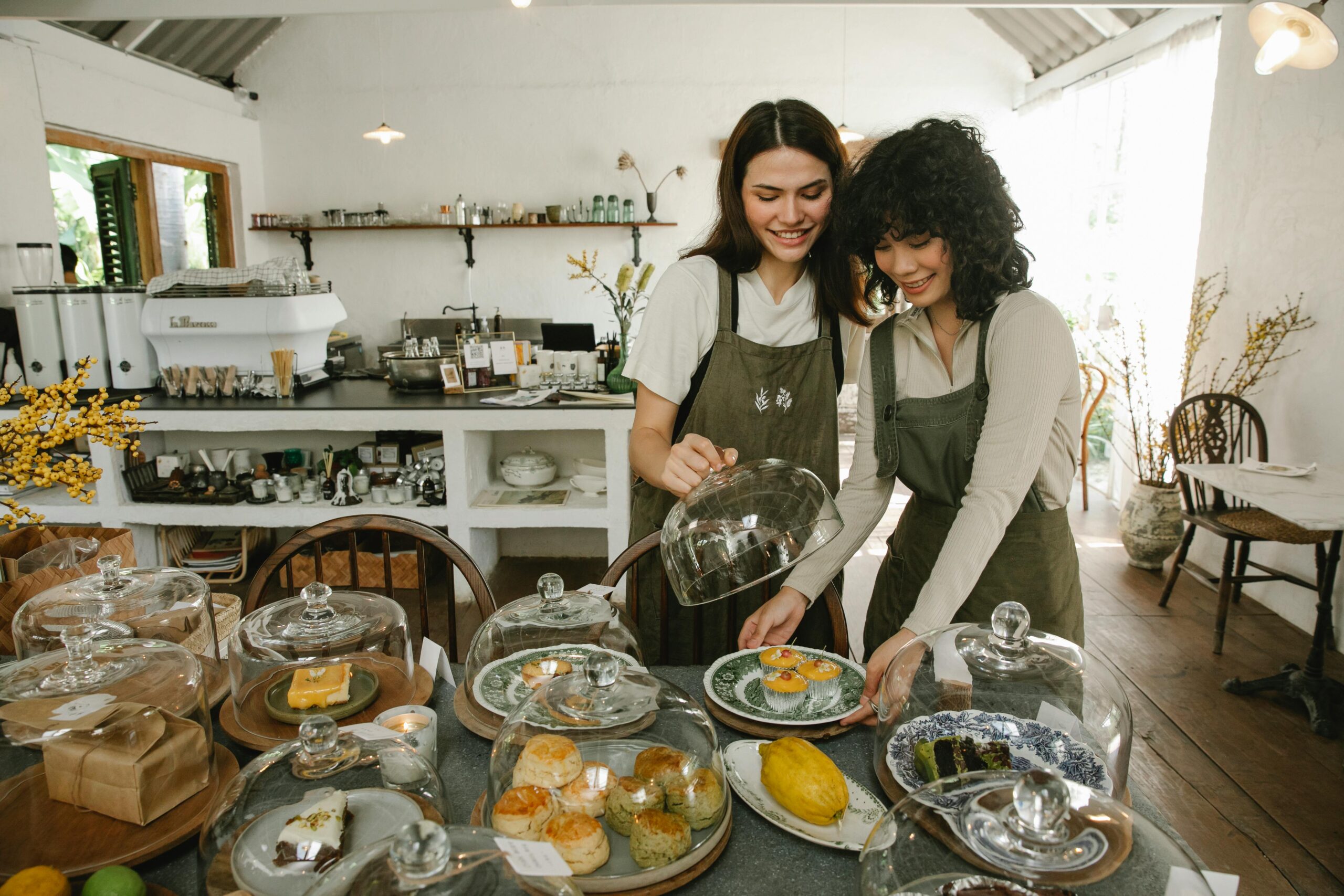 Two people working at a shop