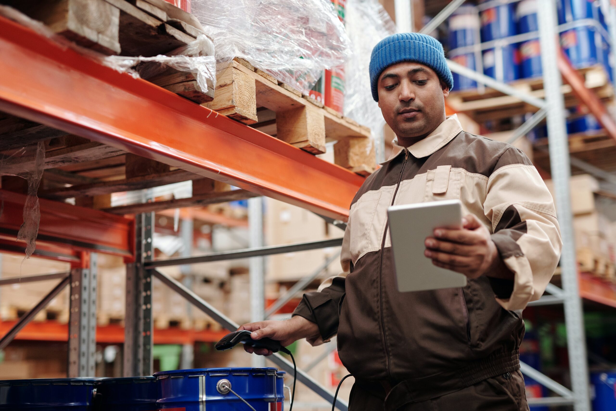 Hardware store employee scanning an item